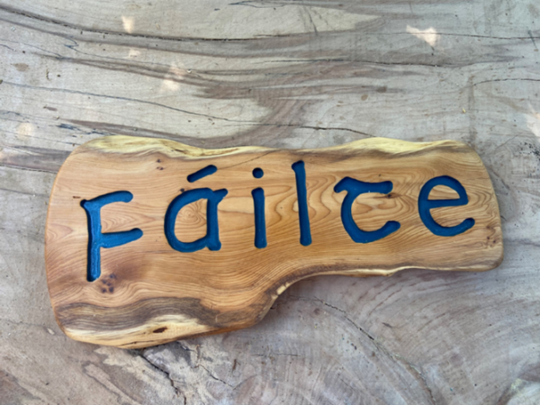 wooden sign woth text